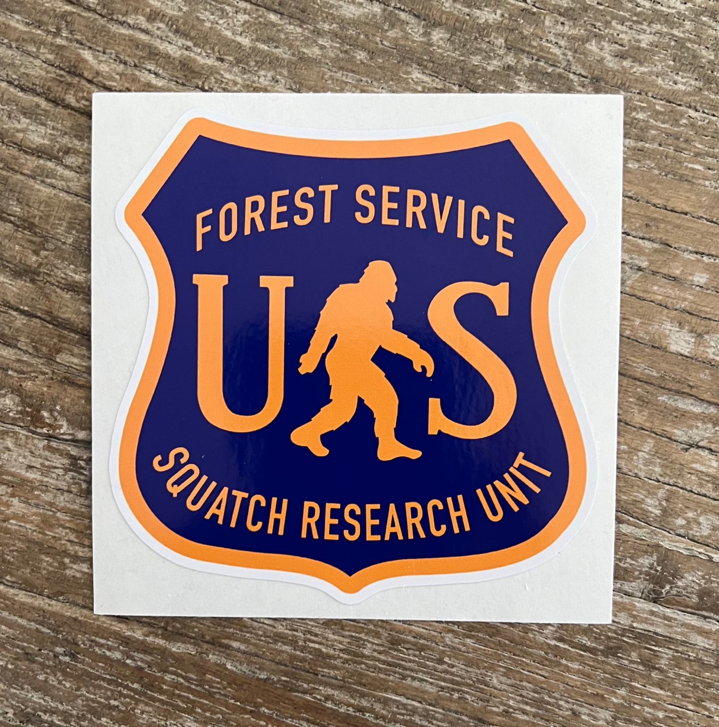 3 inch US Forest Service Sasquatch Hunter Unit Bright yellow and Purple Sticker